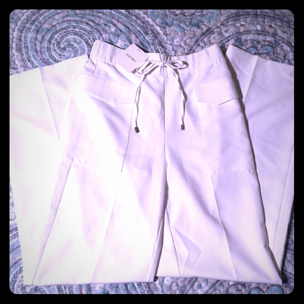 Ellen Tracy white bellbottom dress pants